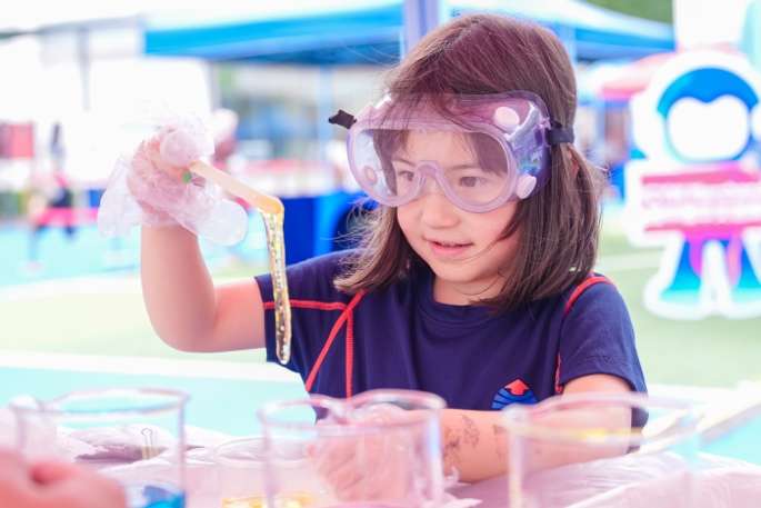 YCIS Beijing student participating in science orientation activity
