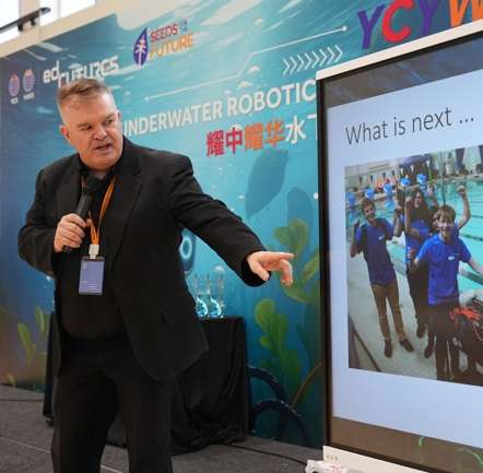 Student speaking at YCYW Underwater Robotics Challenge ceremony