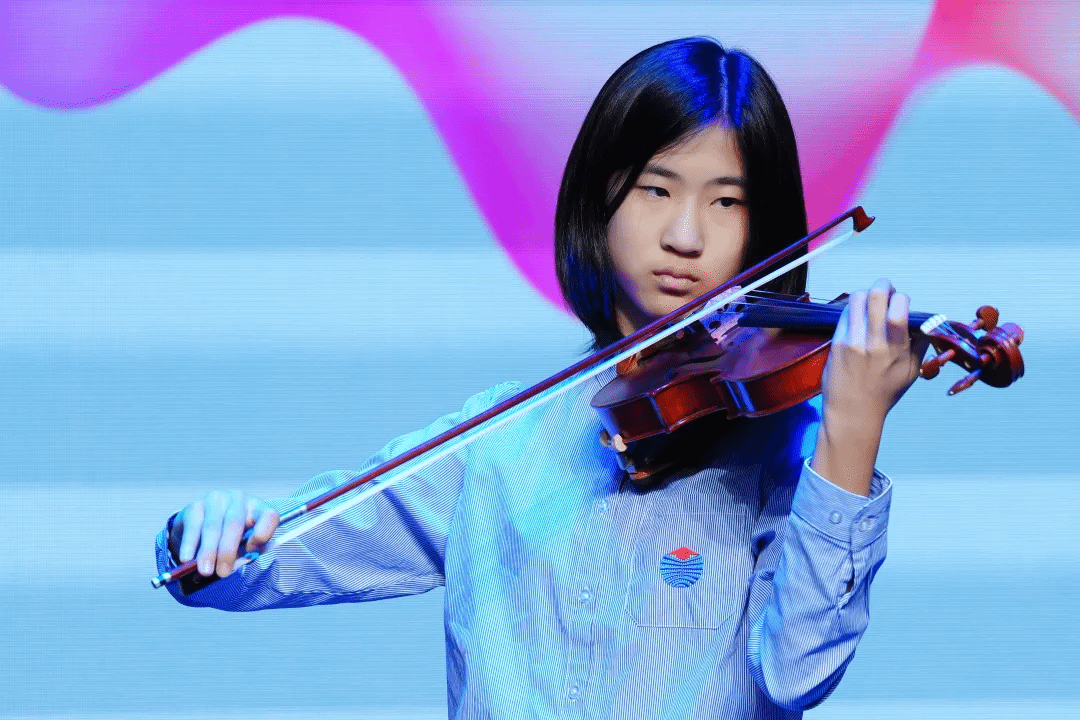 YCIS Beijing students performing at graduation ceremony