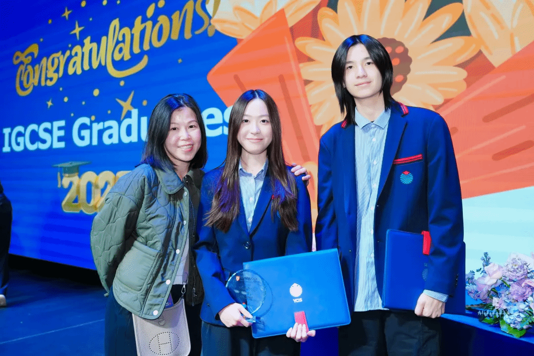 YCIS Beijing IGCSE graduates with families and teachers