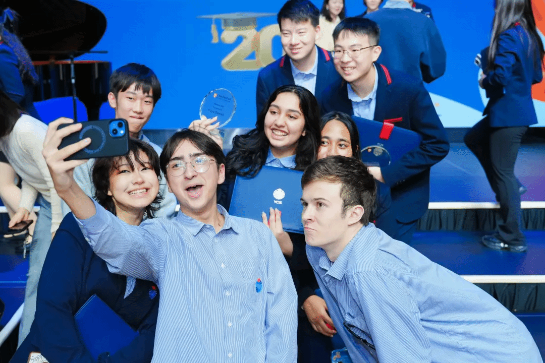 YCIS Beijing students performing at graduation ceremony