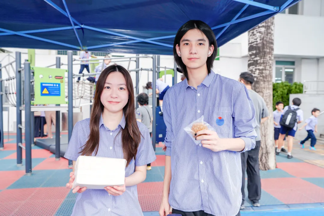 Students supporting Bread of Life charity through bake sale