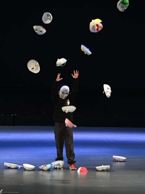 Student participating in a drama workshop