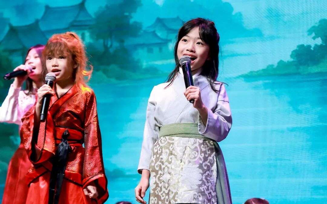 Ensemble cast on stage