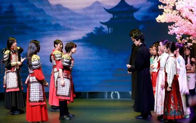 Students taking a bow