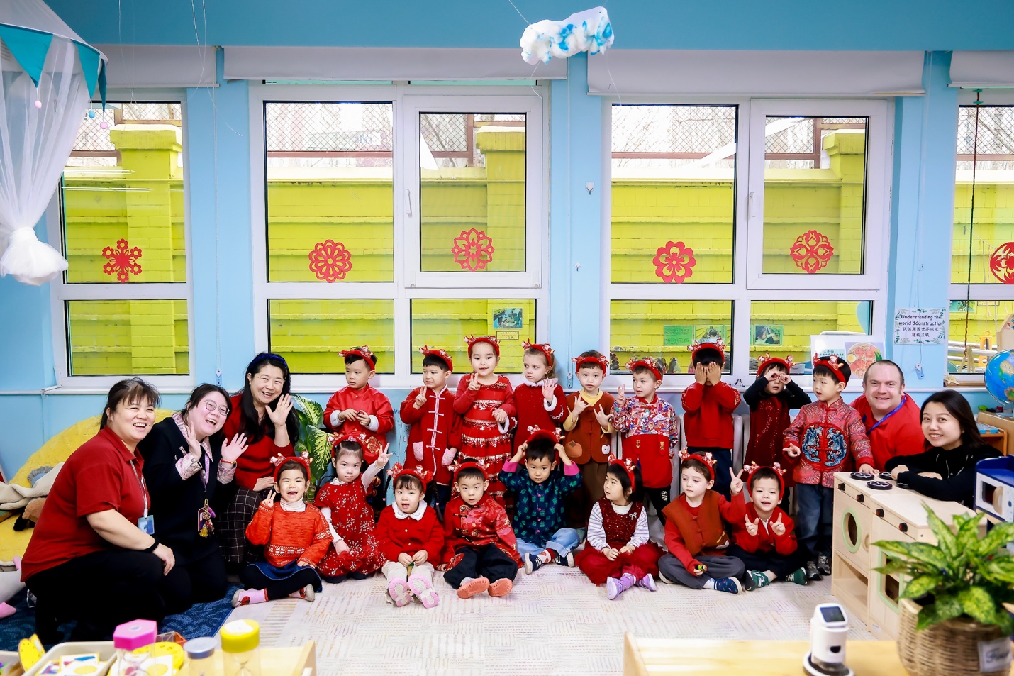 Children posing with crafts