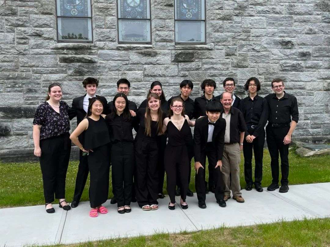 Patrick with fellow musicians at summer camp