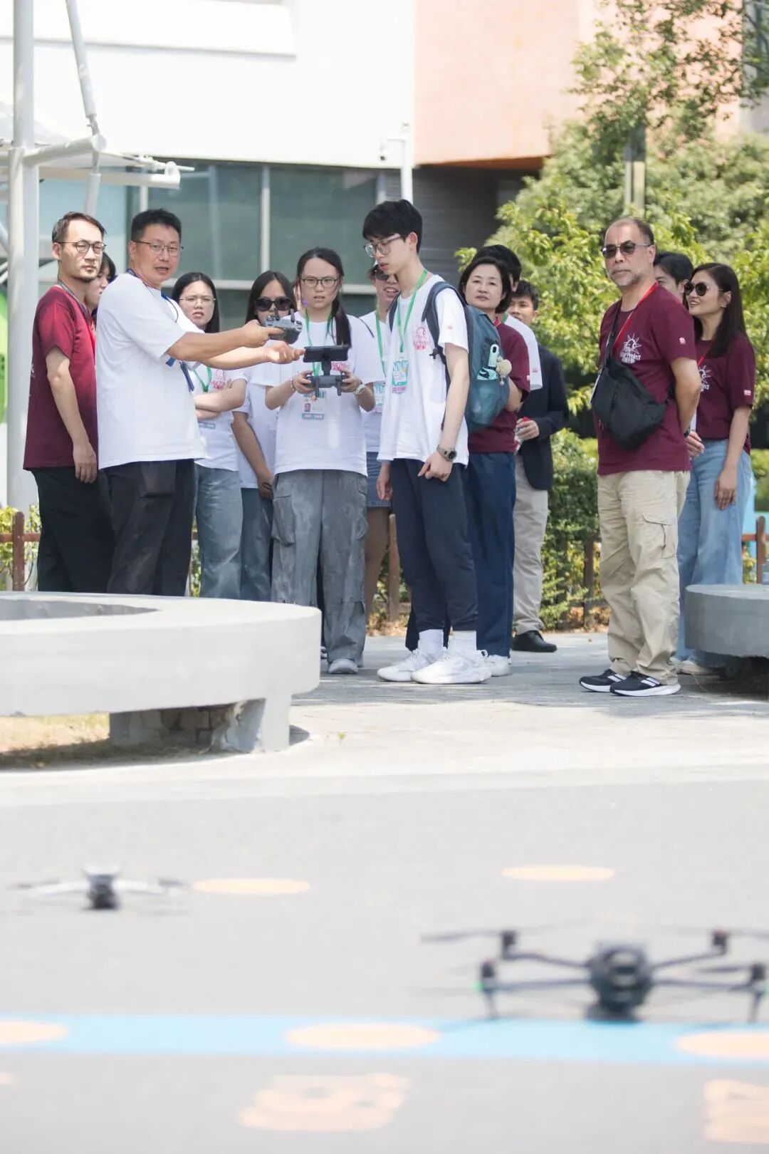 Student pilots a drone indoors, developing spatial awareness at YWIES Zhejiang Tongxiang